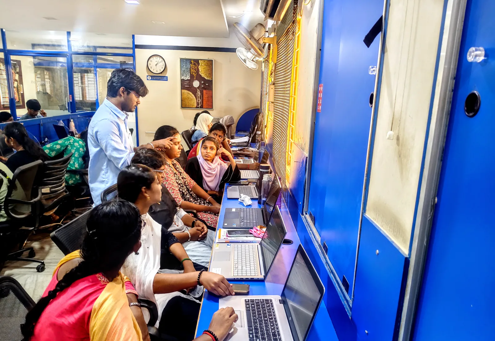 Mentor reviewing intern work during IT training at Hitasoft in Madurai