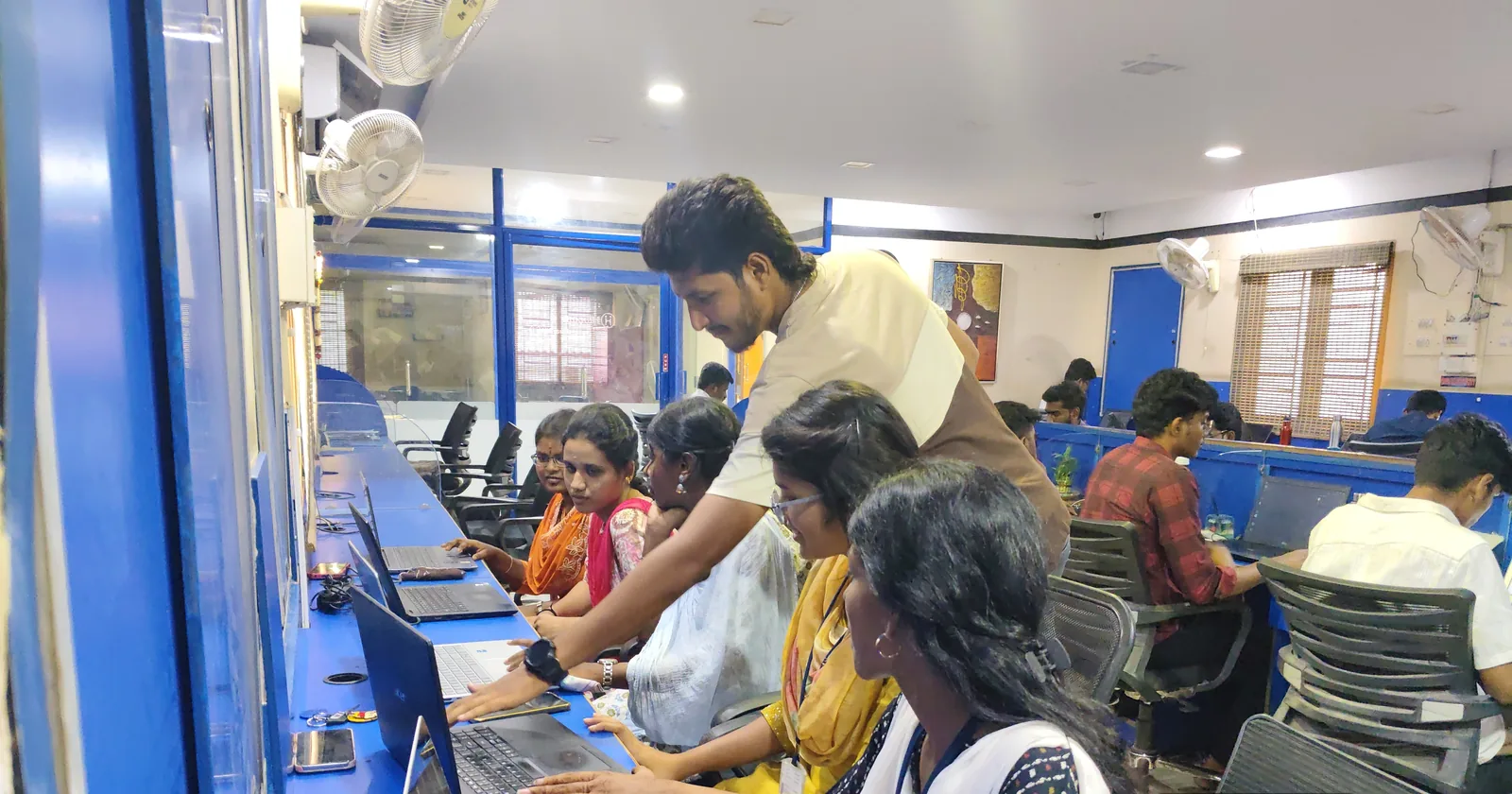 IT training lab at Hitasoft Academy in Madurai, with students working at studio desks